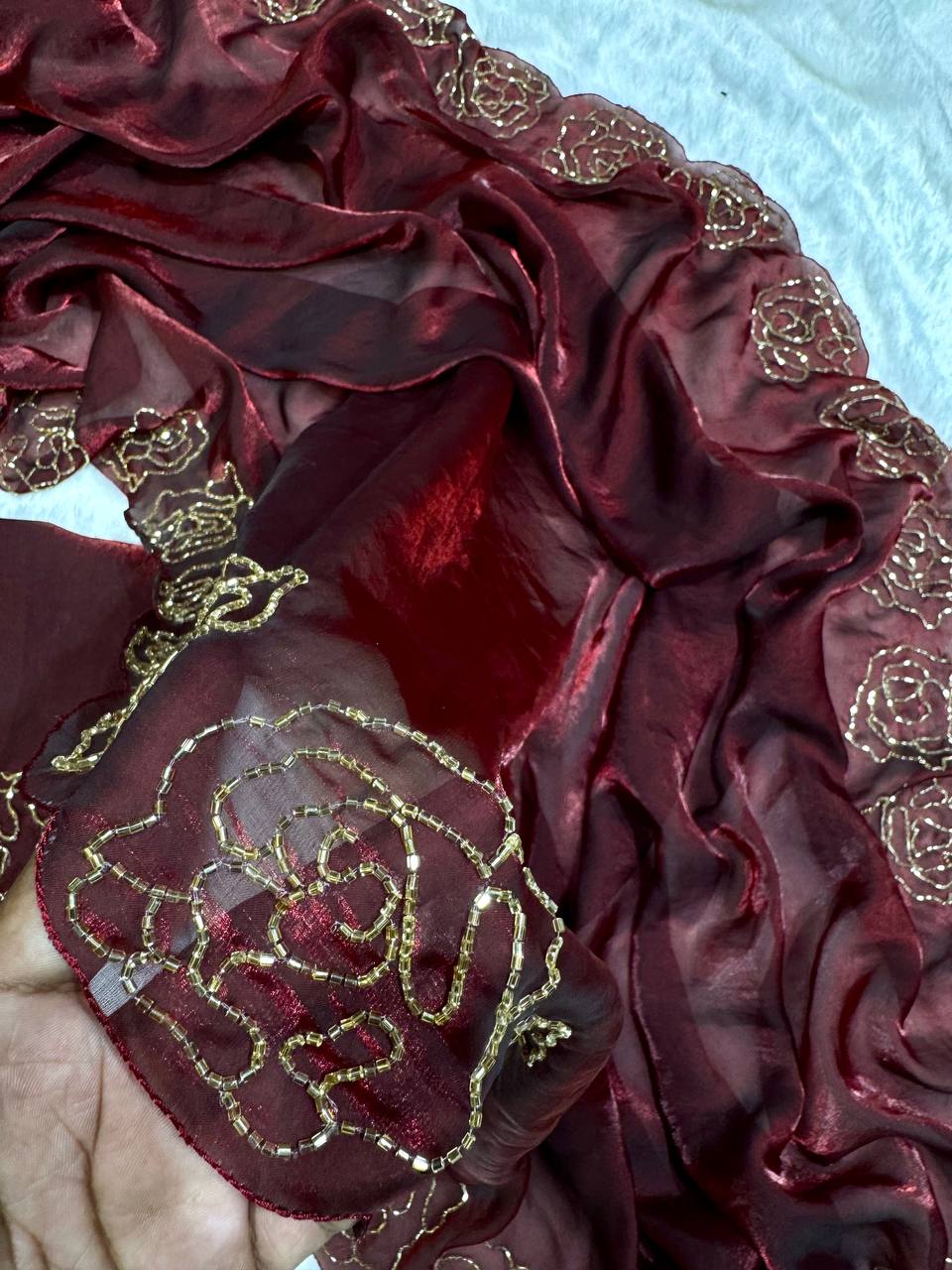 Women's Luxurious Maroon Shimmer Saree with Intricate Gold Zari/Threadwork & Scalloped Border – Complete with Blouse Piece for Festive & Wedding Wear - Image 2